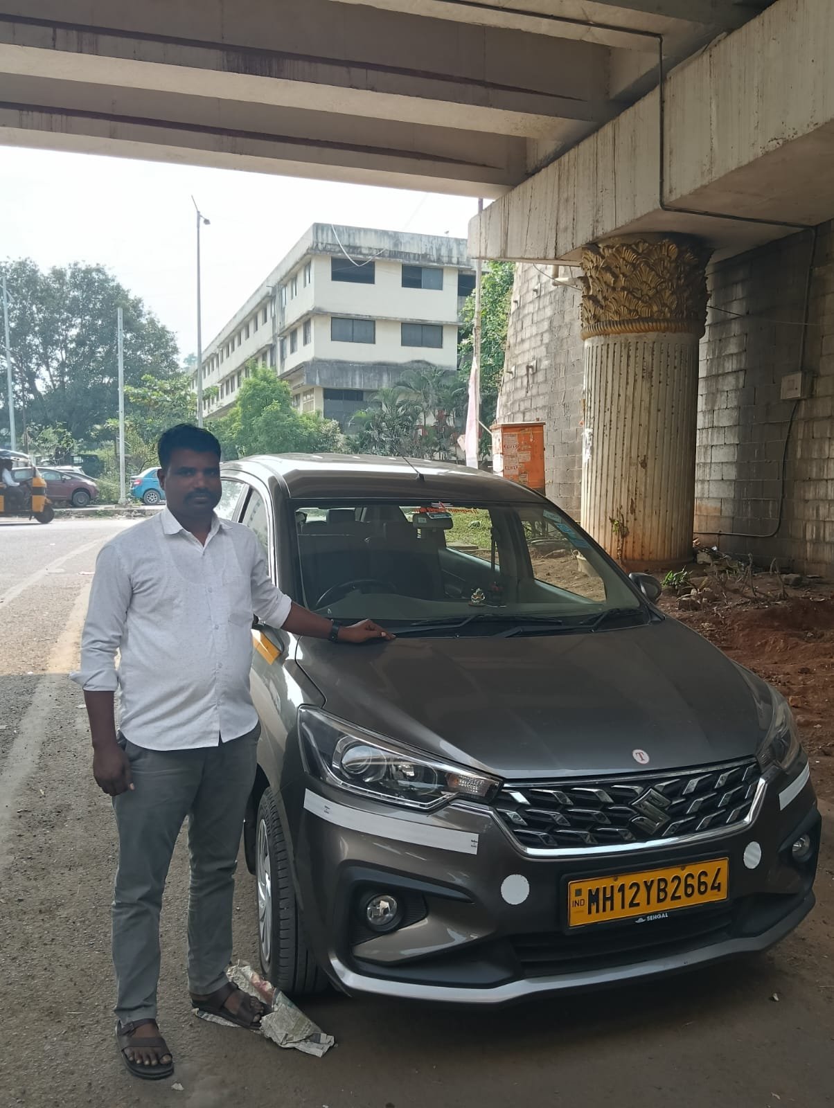 Entrepreneur showing newly financed car